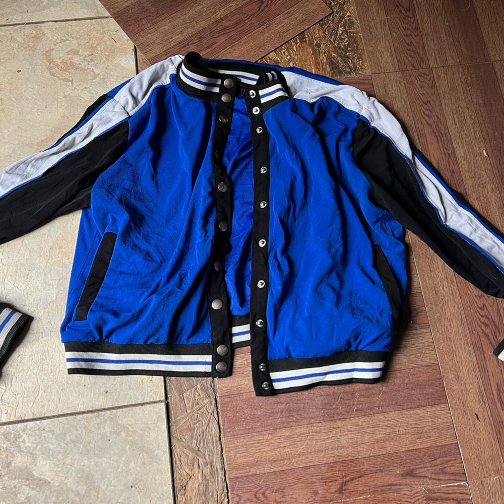 Blue, black and white jacket (size XL)